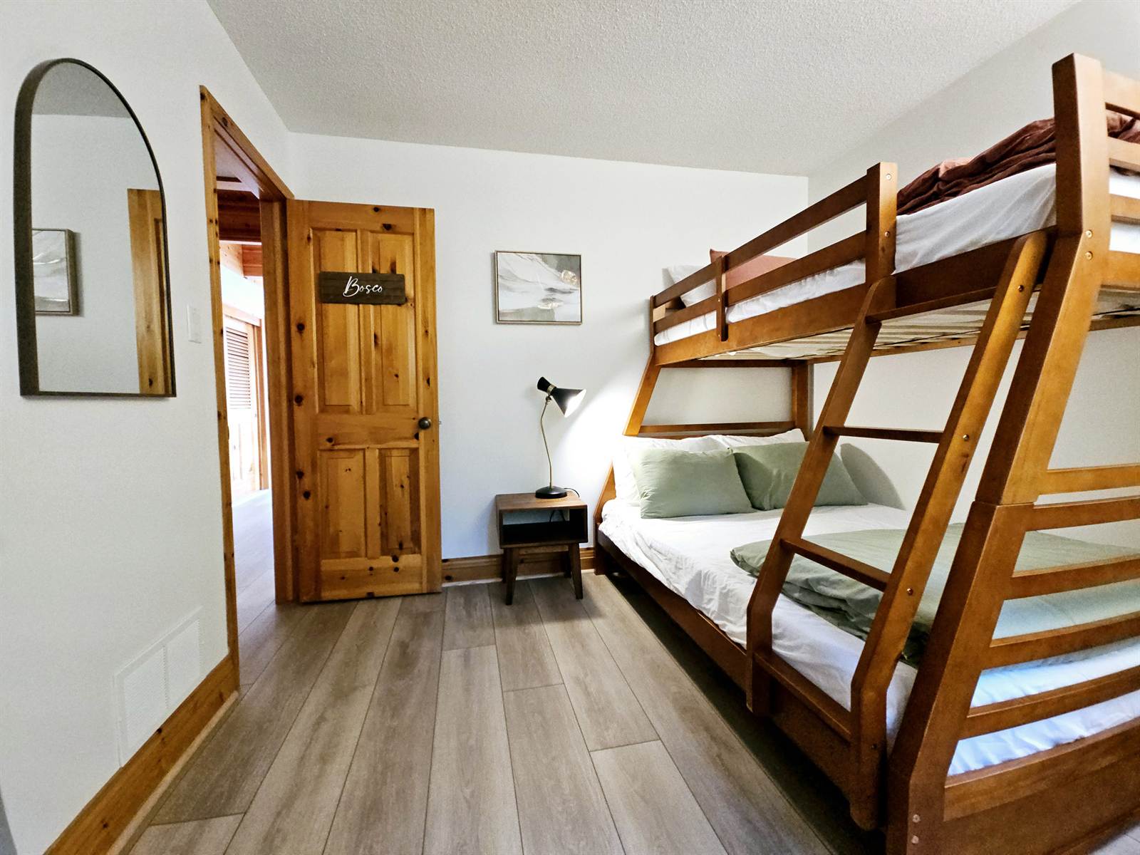 Bosco bedroom with full-over-twin bunk beds, pine door and desk nook