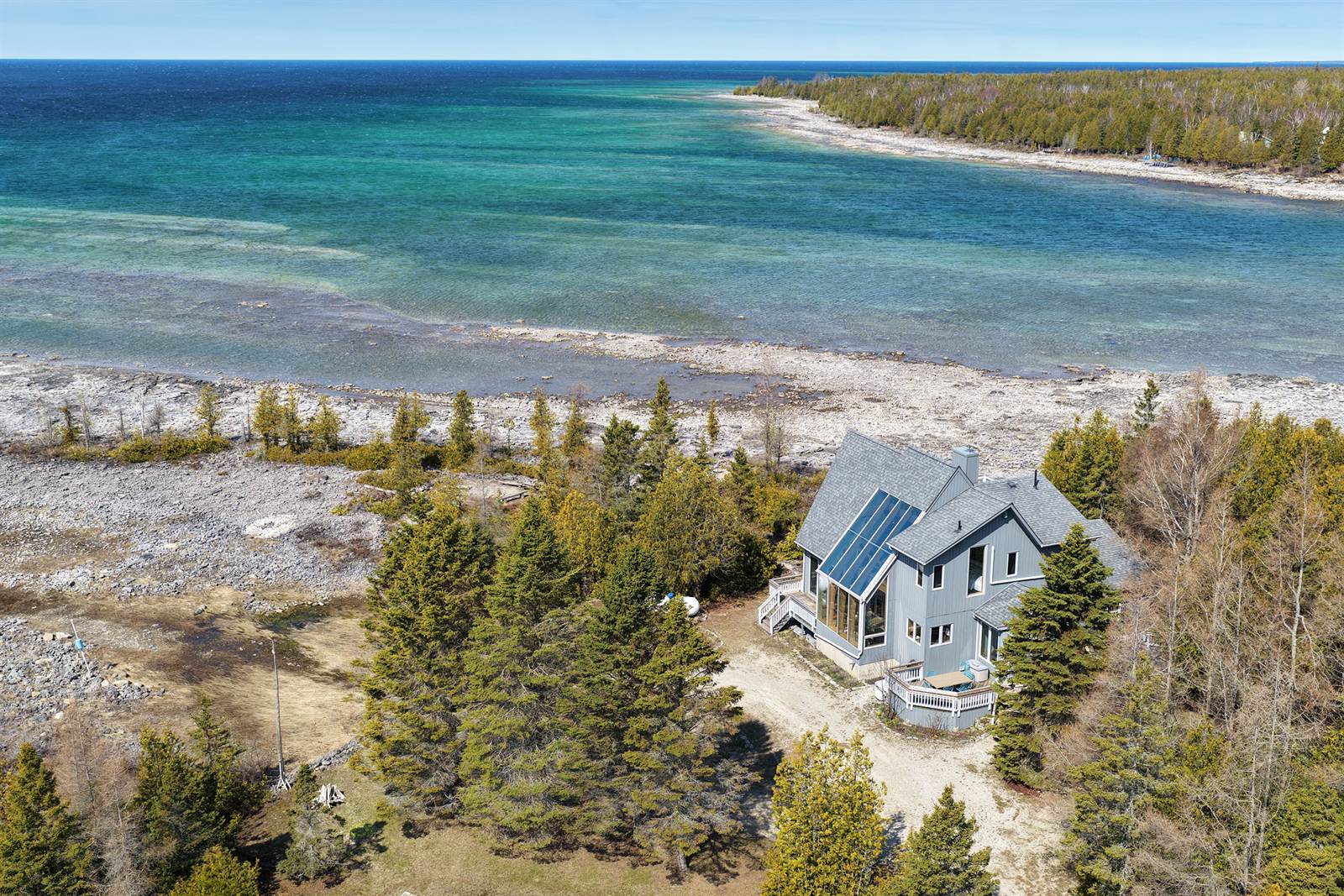 Casolena from above, tucked between cedars and the open bay